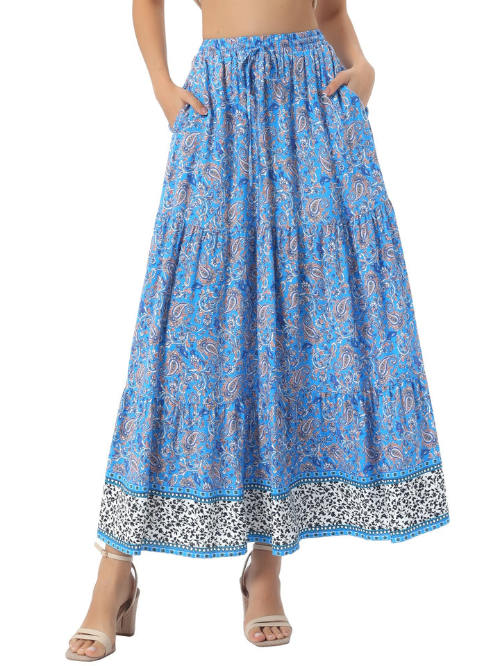 Versatile printed women's high waist maxi skirt, flowing side slit for adaptable fashion.