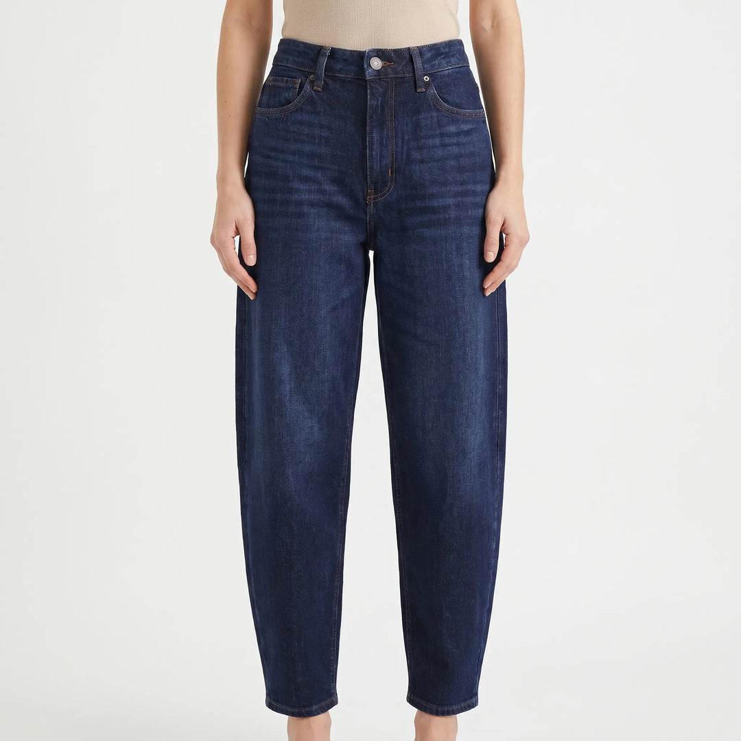 Stylish women's barrel-leg jeans with a high-waist and relaxed fit. Ankle-length, great for spring & fall everyday wear.