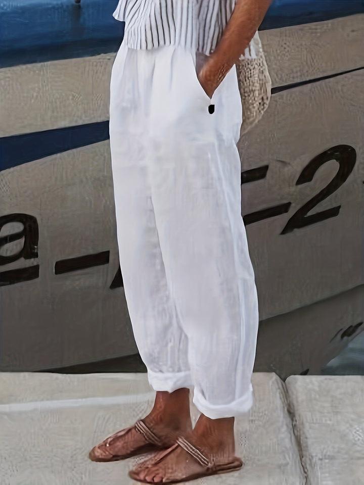 Women's high waist relaxed roll hem pants with pockets, perfect for casual summer style.
