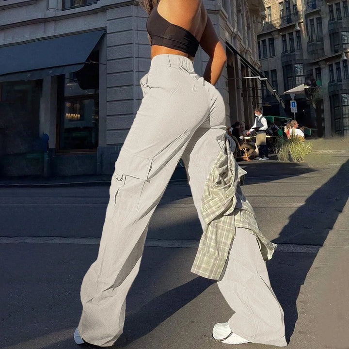 Relaxed fit women's cargo pants with a high waist and wide-leg for modern casual wear.