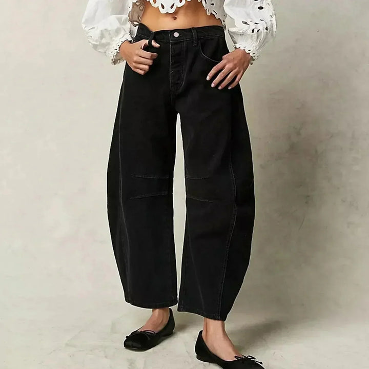 Blue denim high waist wide leg jeans for women, featuring a relaxed fit for daily wear.