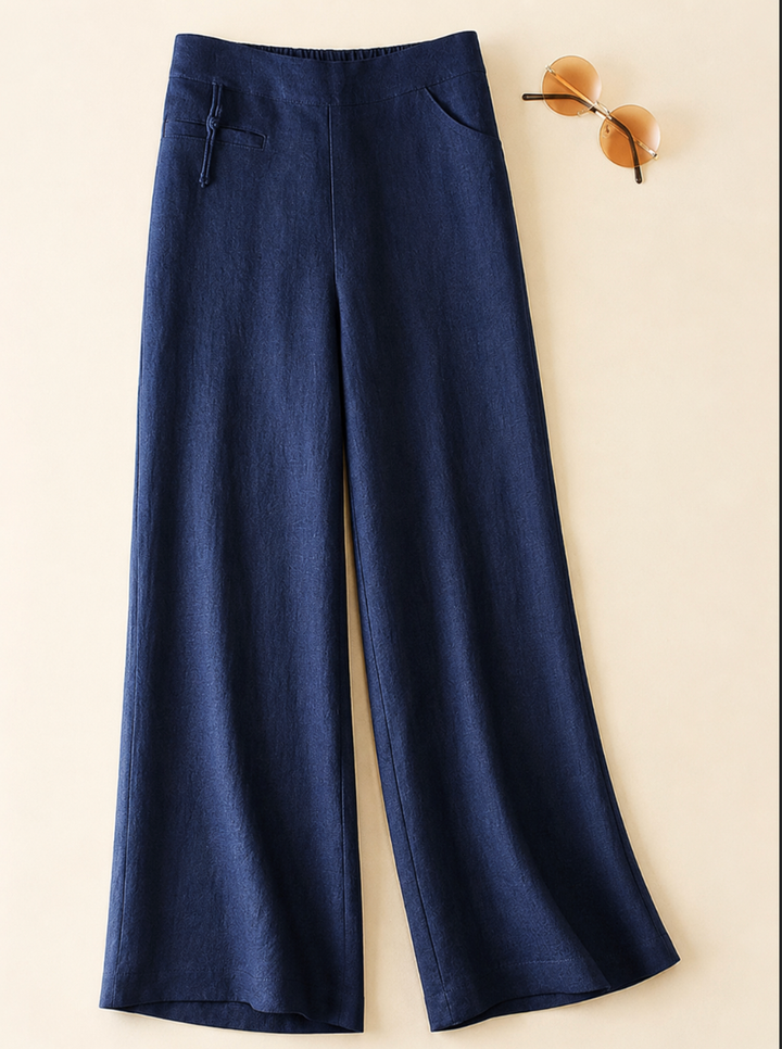 Flowing women's wide-leg summer pants with a comfortable high waist, side pockets, perfect for casual chic style.