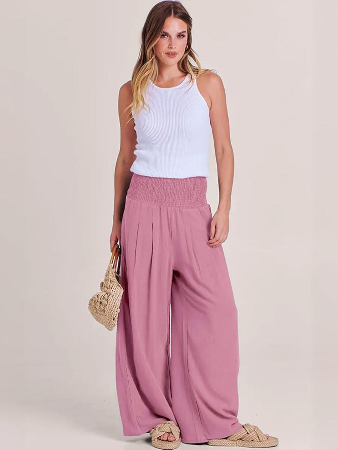Spring fashion women's wide leg trousers, high waist & smocked, comfortable pull-on design.