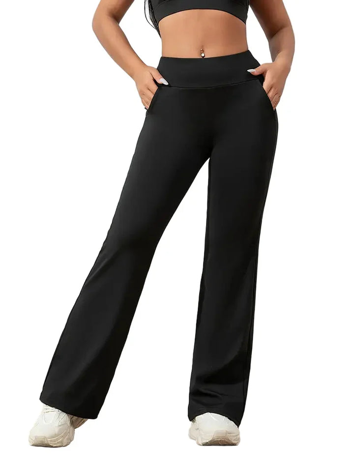 Women's high-waisted flared active pants, perfect for yoga, workout & daily comfort and style.