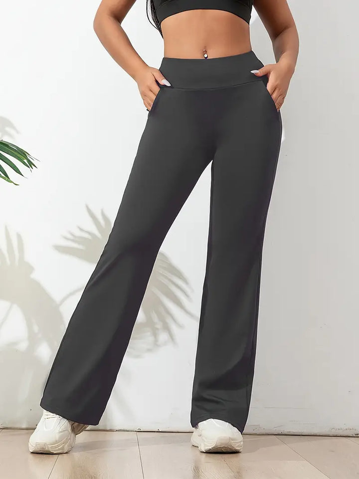 Stretch activewear flared yoga pants for women, offering high-waisted comfort & flexibility for workouts.
