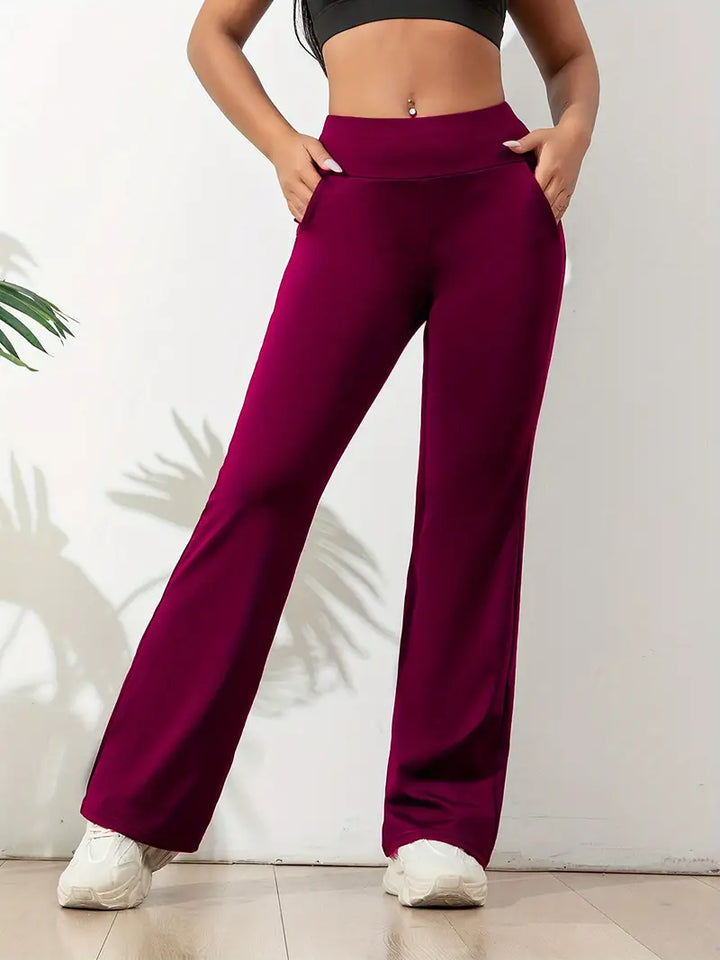 Flattering high-waisted flared stretch pants for women's activewear & yoga, combining comfort with style.