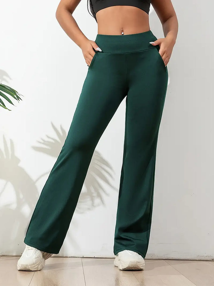Comfy women's high-waisted flared active pants, versatile for yoga, gym workouts, and everyday lounge wear.