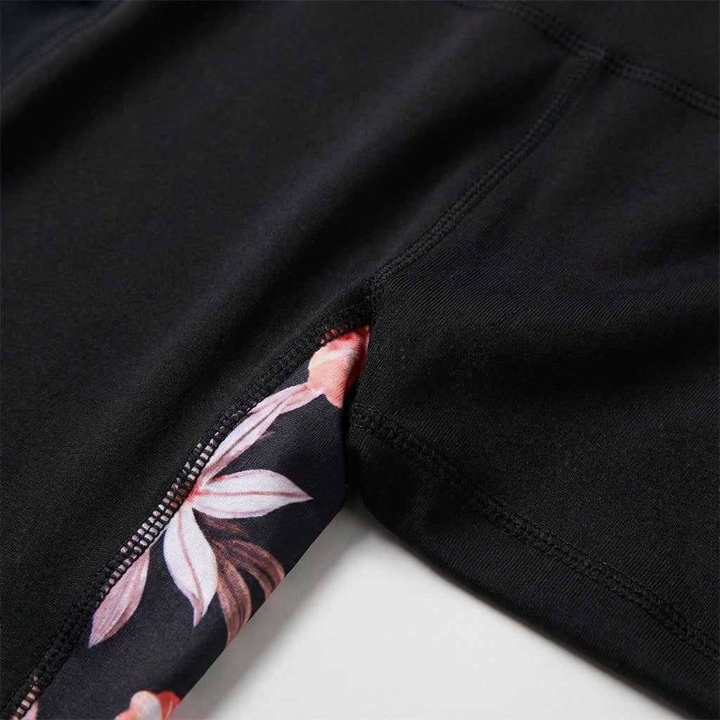 Stylish women's high-waisted leggings featuring a chic floral print. Ideal activewear for gym, yoga, & daily wear.