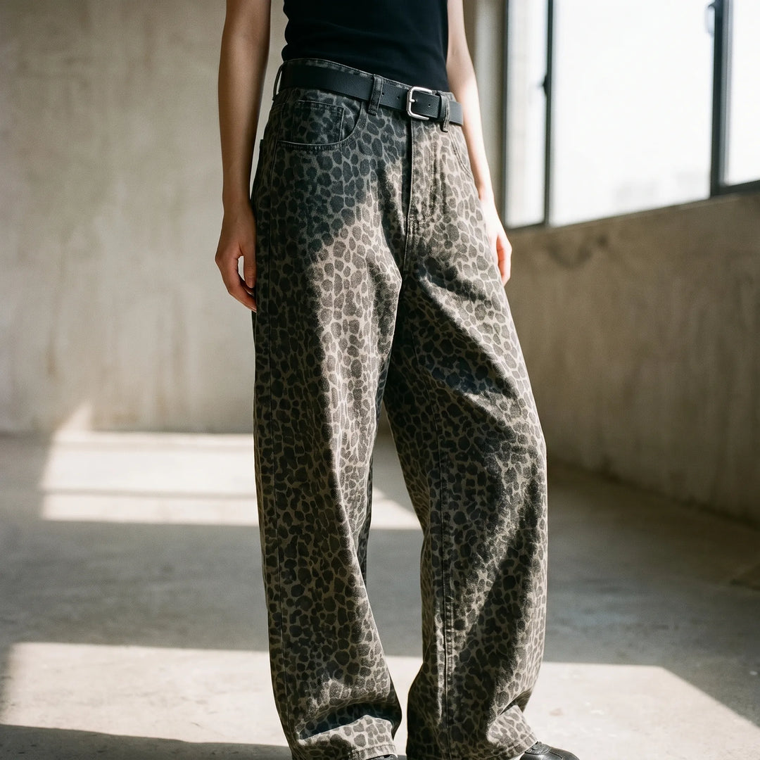 Women's high-waisted leopard print wide-leg pants. Stylish animal print fashion trousers for a trendy look.