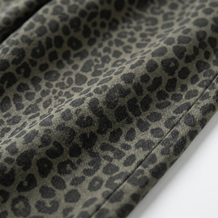 Stylish women's leopard print wide-leg pants, high-waisted for a flattering fit. Trendy animal print fashion.
