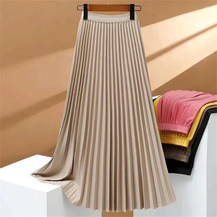Chic women's high-waisted pleated maxi skirt in a beautiful solid color, offering an elegant & comfortable look.