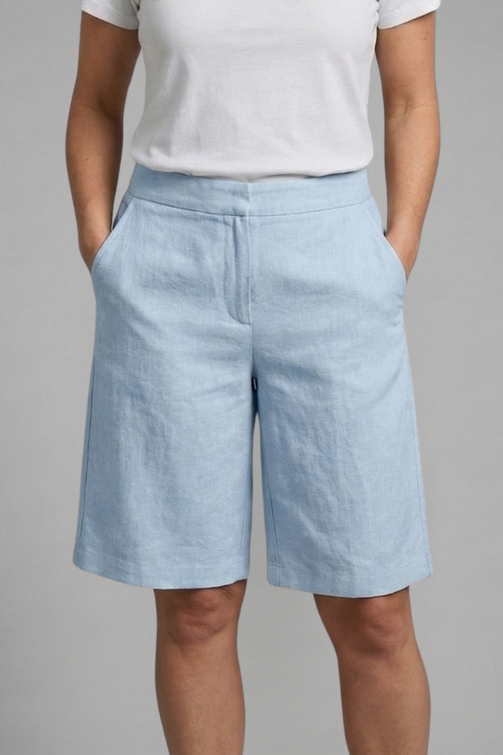 Stylish high-waisted tailored women's shorts, a key piece of summer fashion apparel for a chic look.