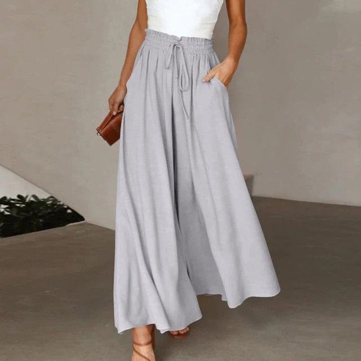 Flowy wide leg palazzo pants, high waisted, ideal for women seeking casual comfort.