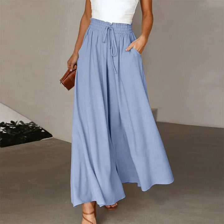 Plus size women's high waisted wide leg palazzo pants, chic and comfortable for summer.