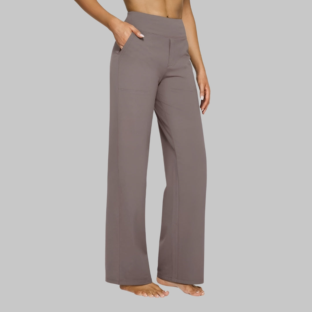 Stylish women's wide-leg trousers, high-waisted design with practical side pockets. Versatile fashion.
