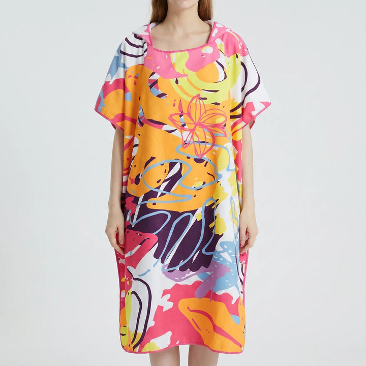 Women's hooded beach changing poncho, quick-dry towel with abstract print. Versatile swim cover-up & pool essential.