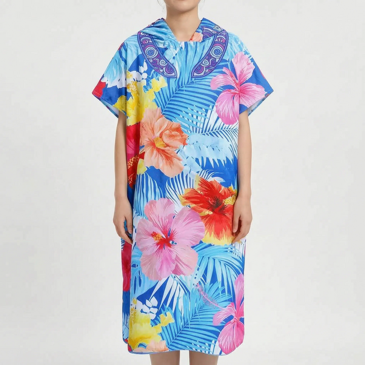 Stylish women's beach poncho, a quick-dry hooded changing robe with eye-catching tropical print.