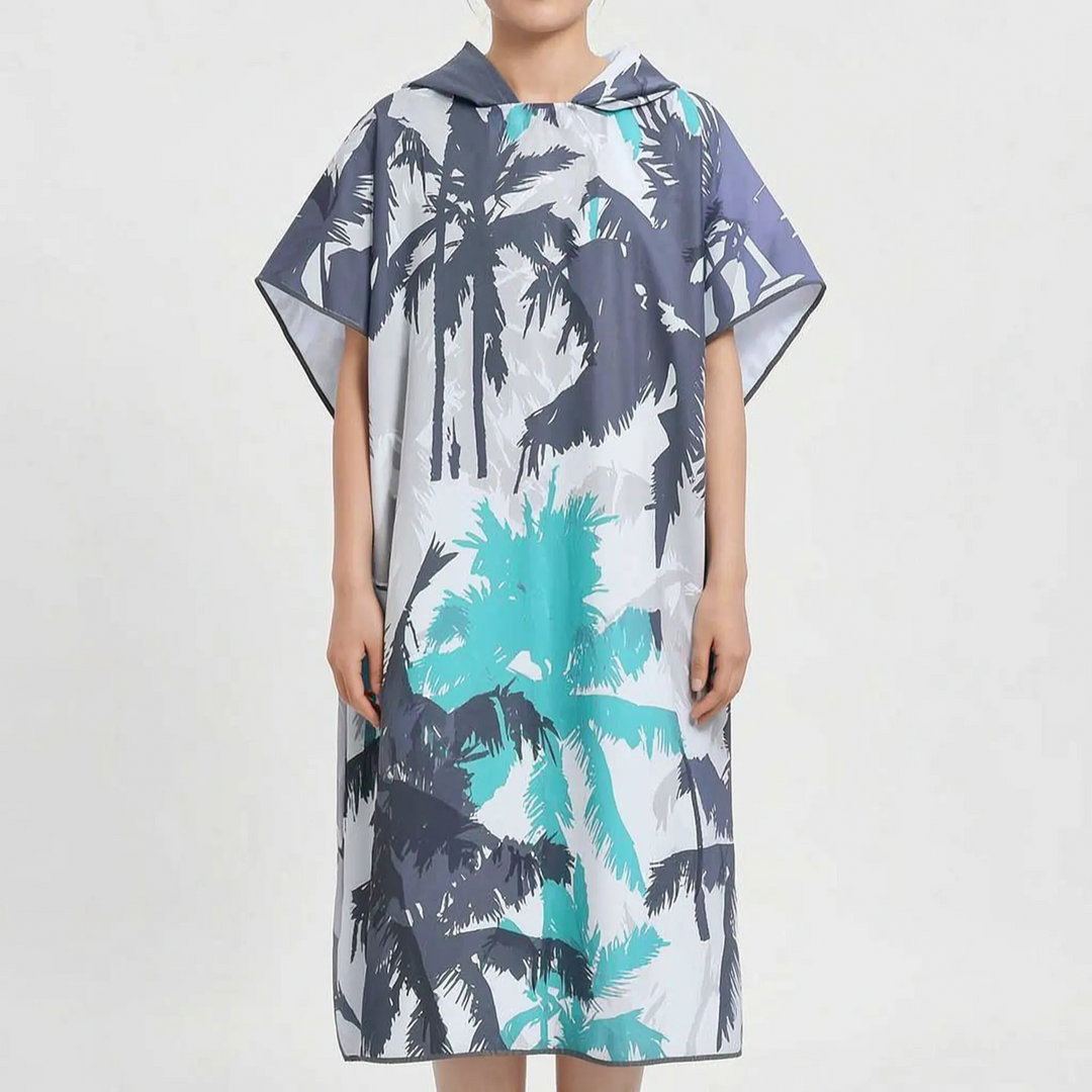 Vacation essential: an oversized women's changing robe, a quick-dry hooded tropical print beach poncho for ease.