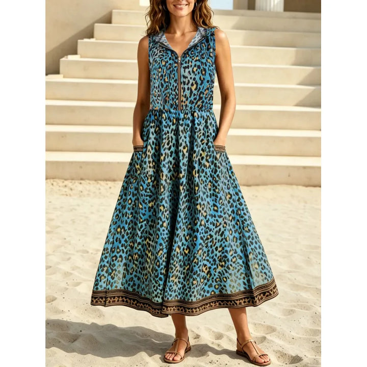 Relaxed fit sleeveless leopard print maxi dress for women, featuring a hood and zipper. Ideal for summer fashion.