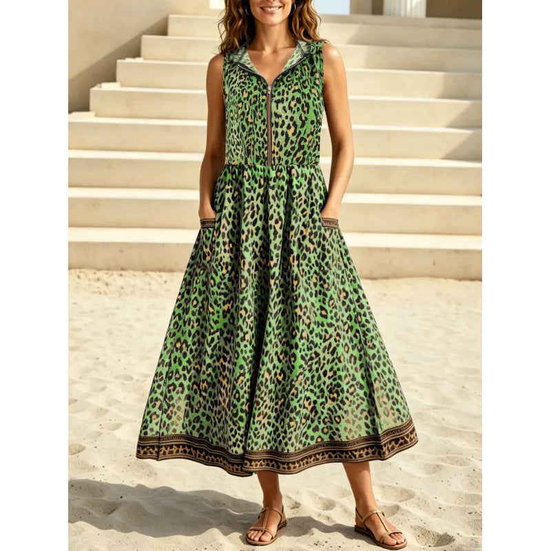 Women's hooded leopard print maxi dress with zipper & pockets, offering a comfortable, trendy summer look.