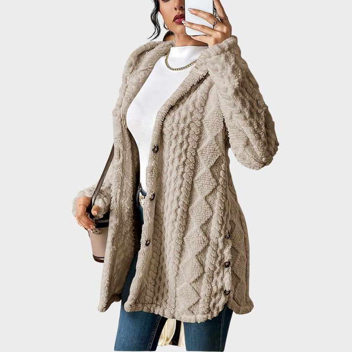 Stylish women's long coat, oversized fit, featuring a cozy hood and front button details.