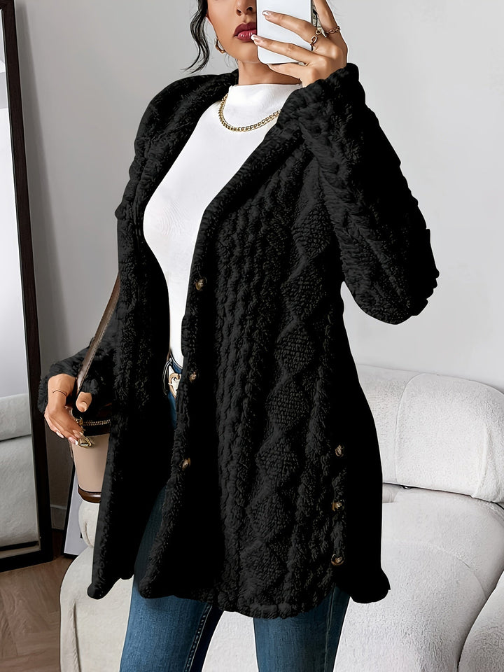 Oversized women's fall jacket, a long hooded coat with sleek button-up front.