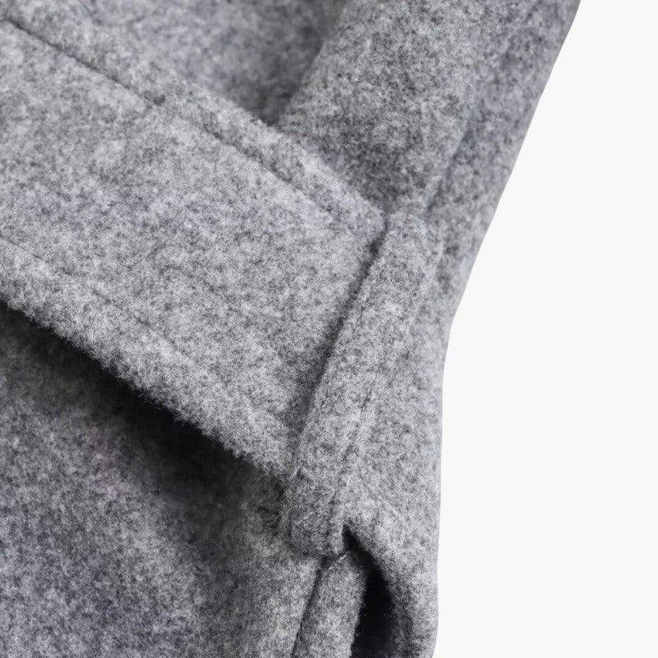 Durable women's hooded trench coat, classic design, weather-ready & stylish long coat.