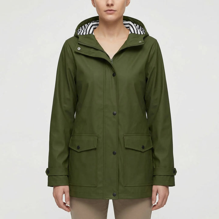 Lightweight women's hooded waterproof jacket. Packable rain gear for hiking & adventure travel.