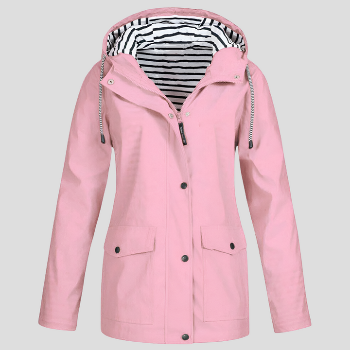 Close-up of women's hooded waterproof windbreaker jacket fabric & adjustable hood. Lightweight all-weather protection.