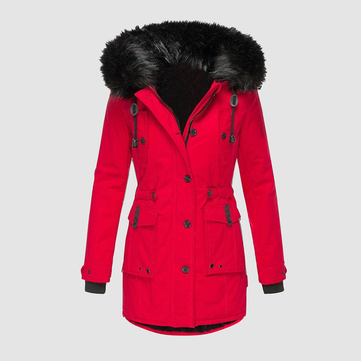 Soft & cozy women's insulated parka, a durable weatherproof hooded winter coat for warmth.