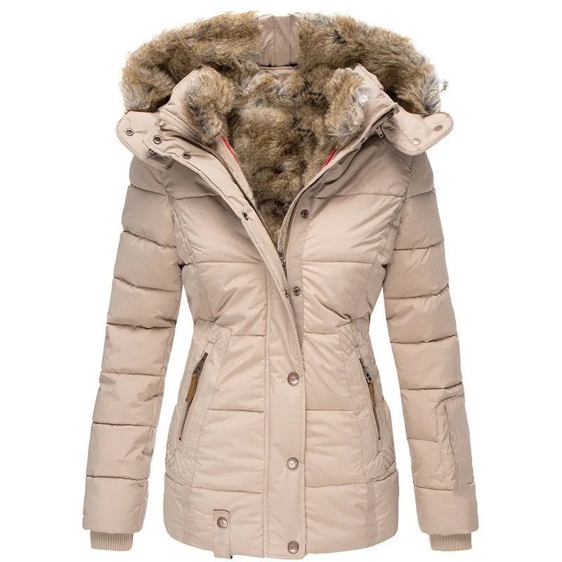 Cozy & chic: women's insulated winter jacket featuring a plush faux fur hood.