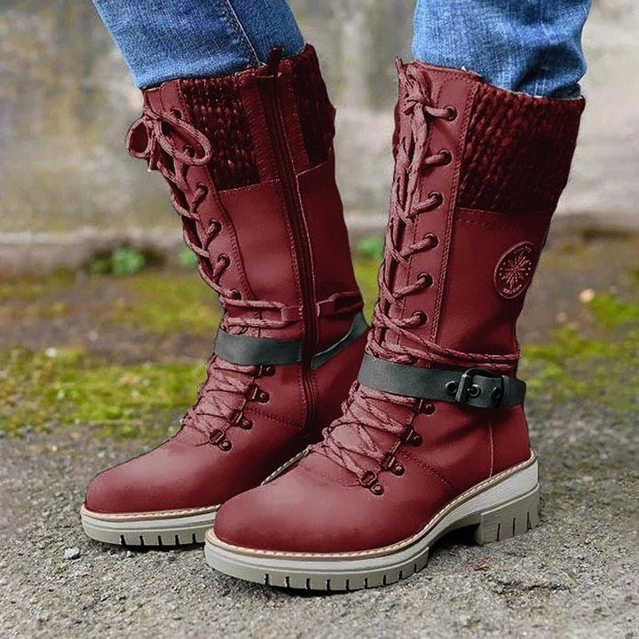 Stylish women's fashion boots, insulated for winter. Trendy ankle boots offering warmth and a chic cold weather look.