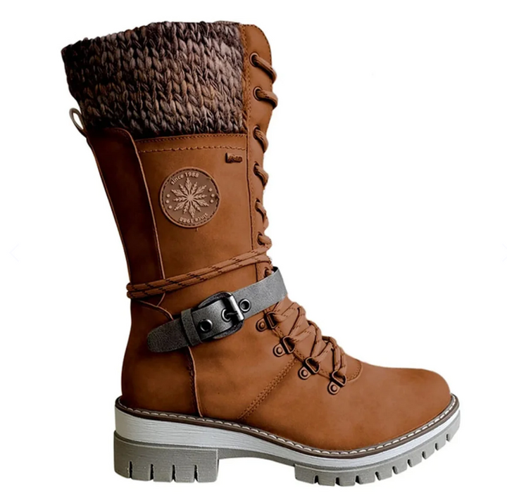 Insulated women's winter boots with cozy faux fur lining. Stylish & warm for cold days, perfect daily wear.