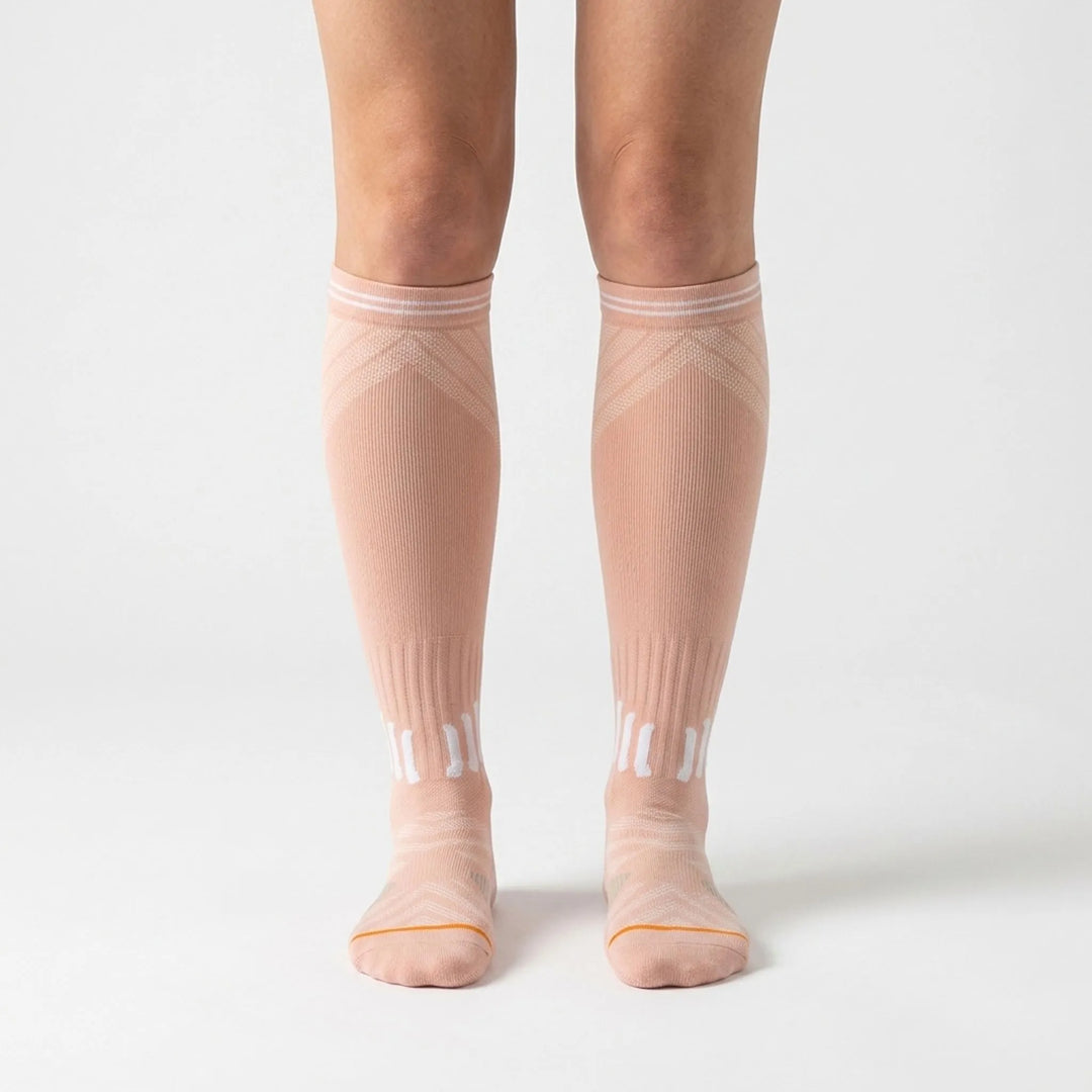 Comfortable women's knee-high compression socks, ideal for everyday wear and active lifestyles.