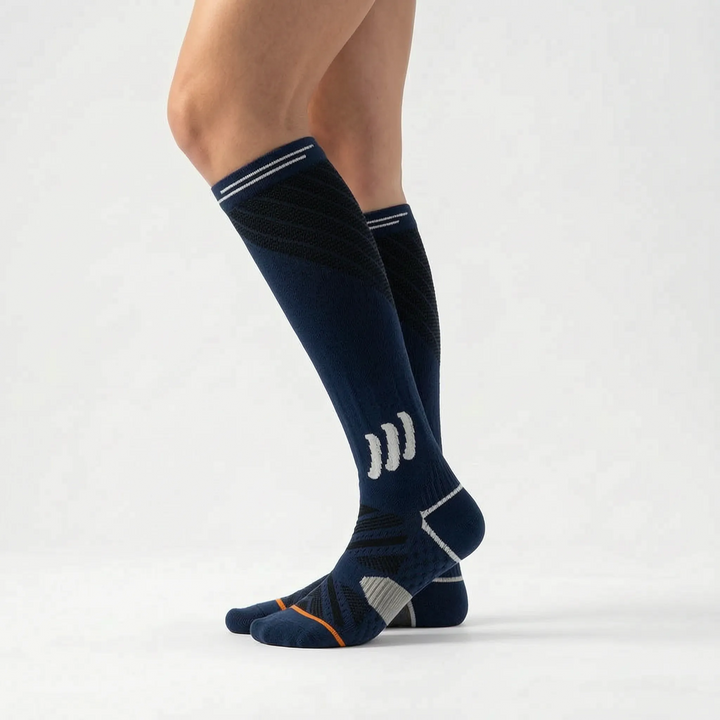 Athletic women's knee-high compression socks, offering muscle support for fitness and activewear.