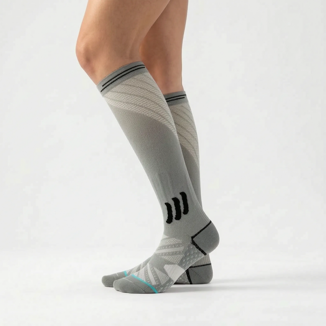 Women's knee-high compression socks for standing jobs, reducing fatigue and boosting leg comfort.
