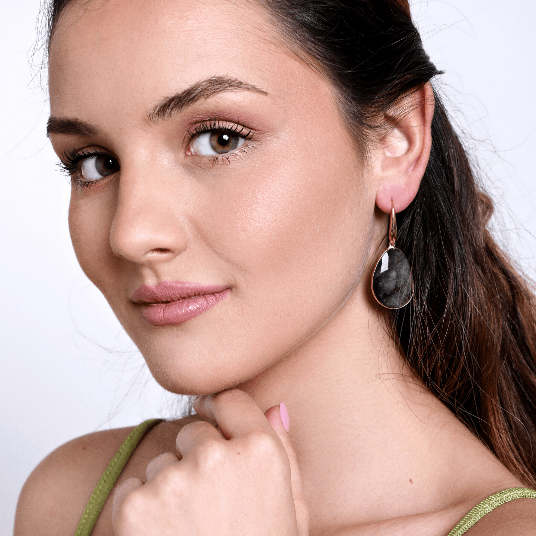 Close-up of Labradorite Dreamy Drop Earrings, highlighting the unique iridescence & natural beauty of the gemstone.