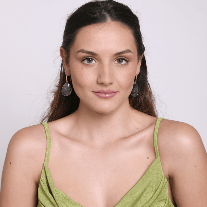 Chic women's Labradorite drop earrings, a versatile spiritual gemstone jewelry piece for everyday wear.
