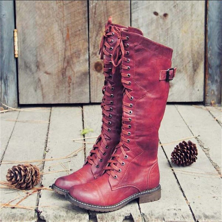 Stylish women's knee-high lace-up riding boots, perfect for casual everyday outfits & fall fashion.
