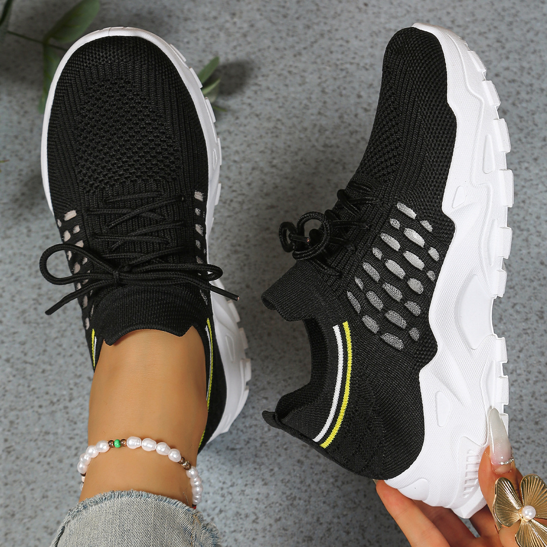 Comfortable women's orthopedic walking sneakers with a lace-up design for active lifestyles and daily wear.