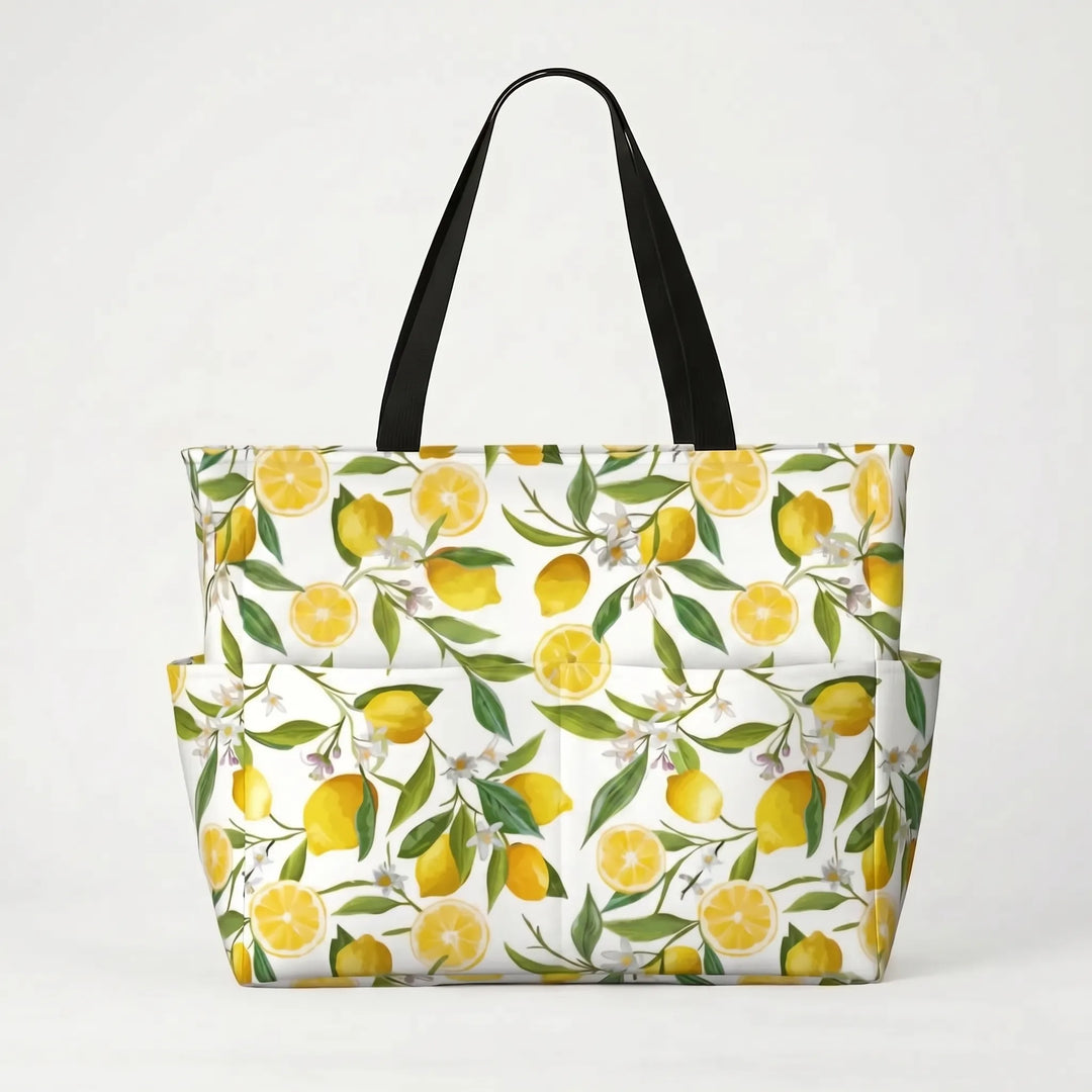 Women's large tropical lemon print shoulder beach tote, comfy for carrying vacation essentials.