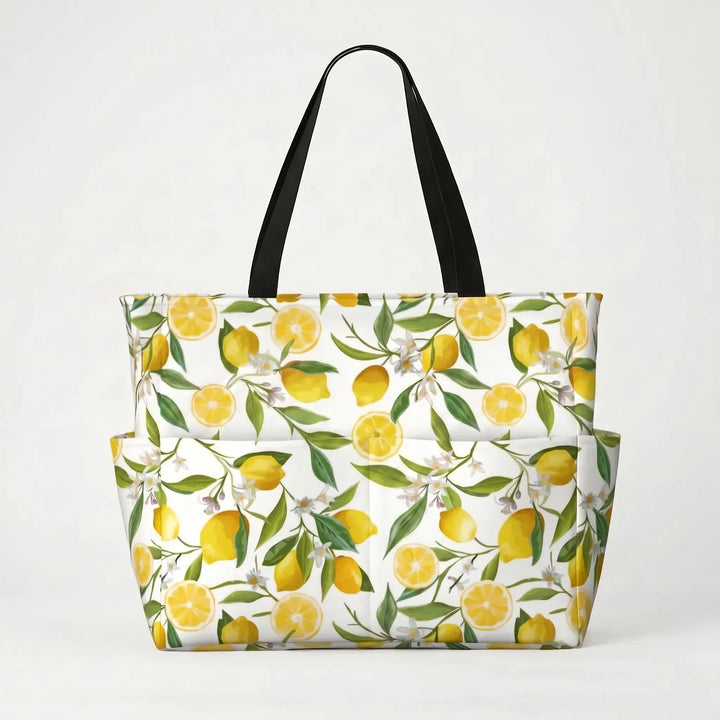 Women's large tropical lemon print shoulder beach tote, comfy for carrying vacation essentials.