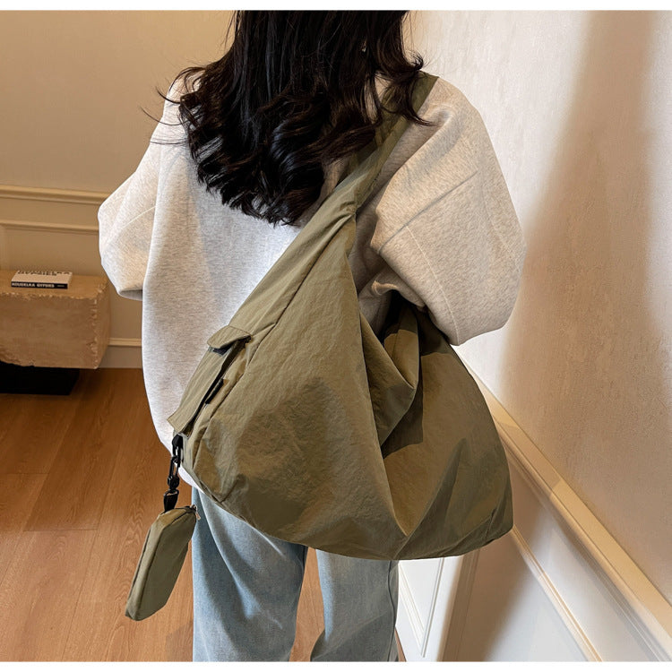 Women's large capacity crossbody bag, perfect for daily essentials & travel.