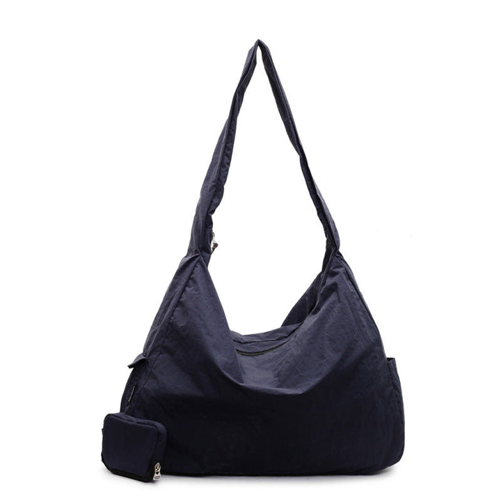 Women's versatile large capacity crossbody, shoulder, or hobo bag for chic daily organization.