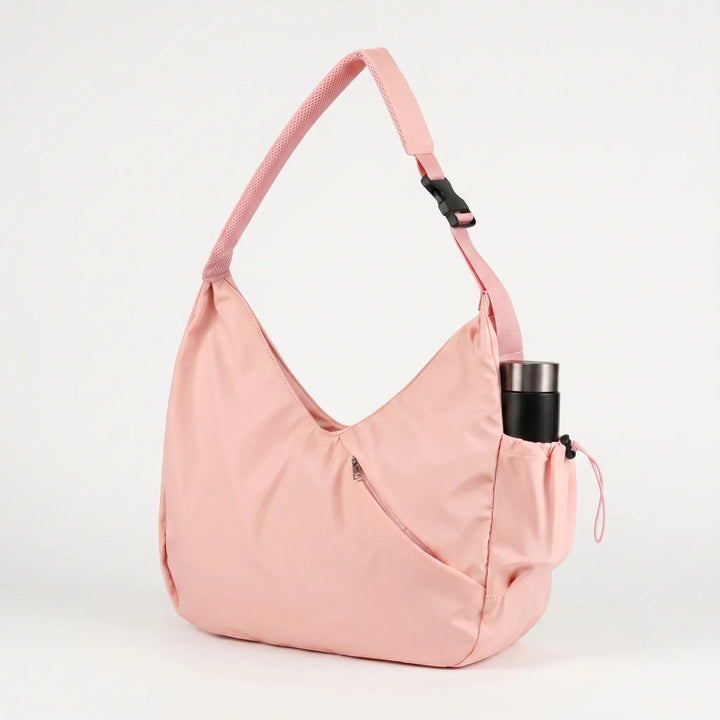 Versatile women's shoulder bag: large fitness tote with yoga mat straps, great for travel & gym workouts.