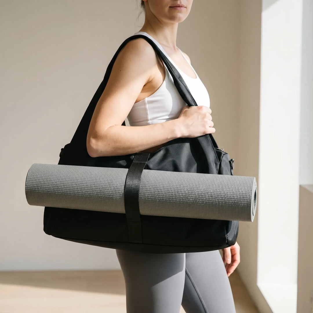 Women's large gym duffel bag with a dedicated shoe compartment, perfect for fitness and travel.