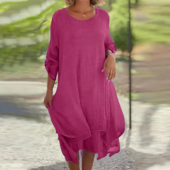 Women's layered midi dress with flowy 3/4 sleeves, perfect for casual summer wear.