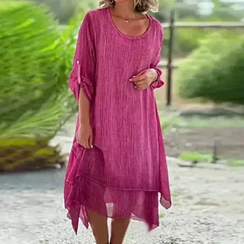 Feminine casual layered midi dress for women with comfortable 3/4 sleeves, great for summer.