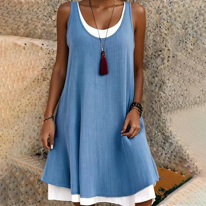 Sleeveless scoop neck women's layered mini dress. Casual A-line summer dress, fashionable and versatile.