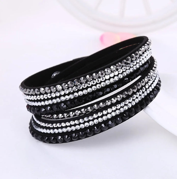 Women's layered rhinestone wrap bracelet. Elegant, adjustable fashion accessory with sparkle.